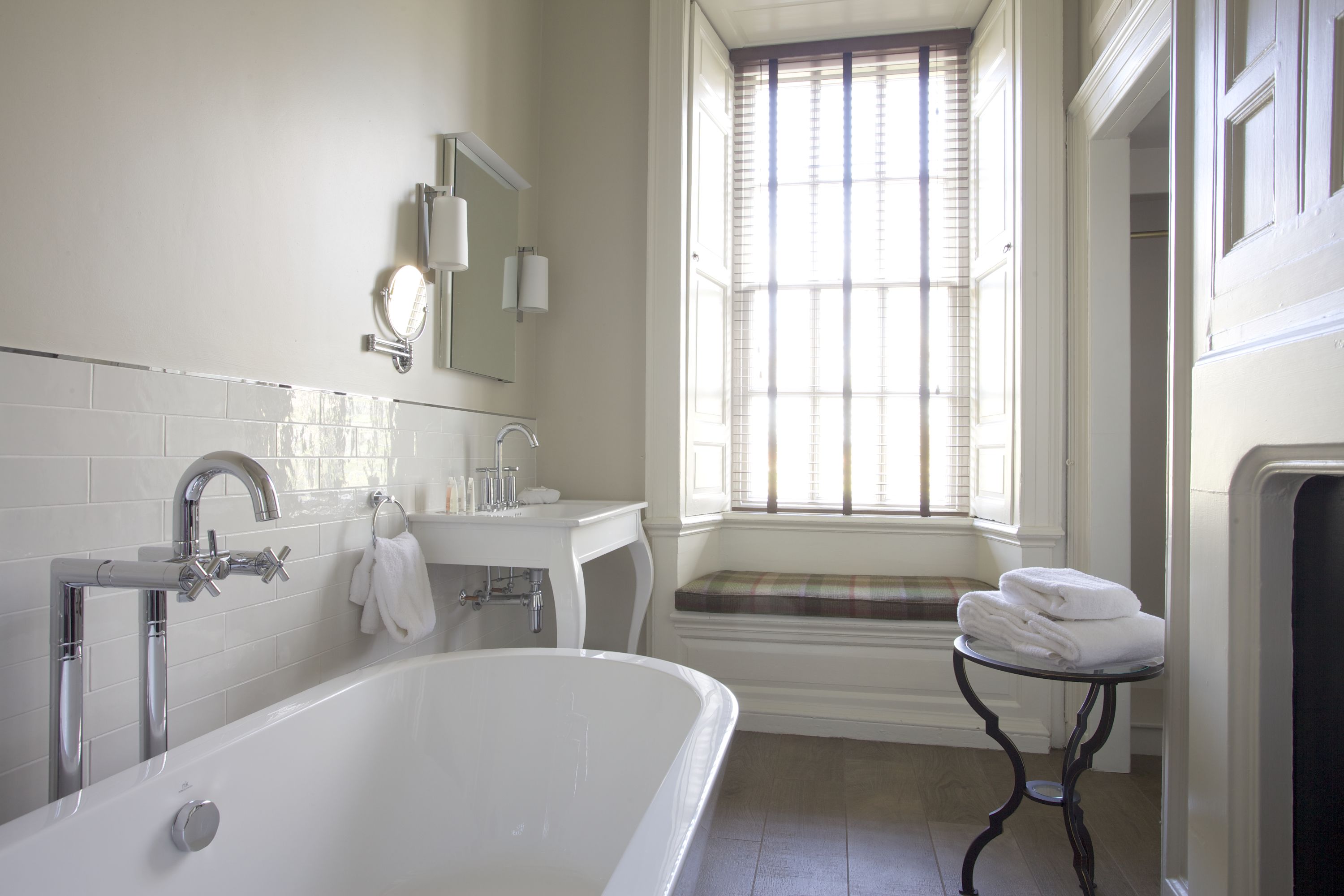 designer toiletries, hair dryer, towels