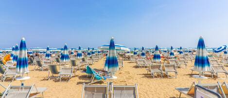 Beach nearby, sun loungers, beach umbrellas