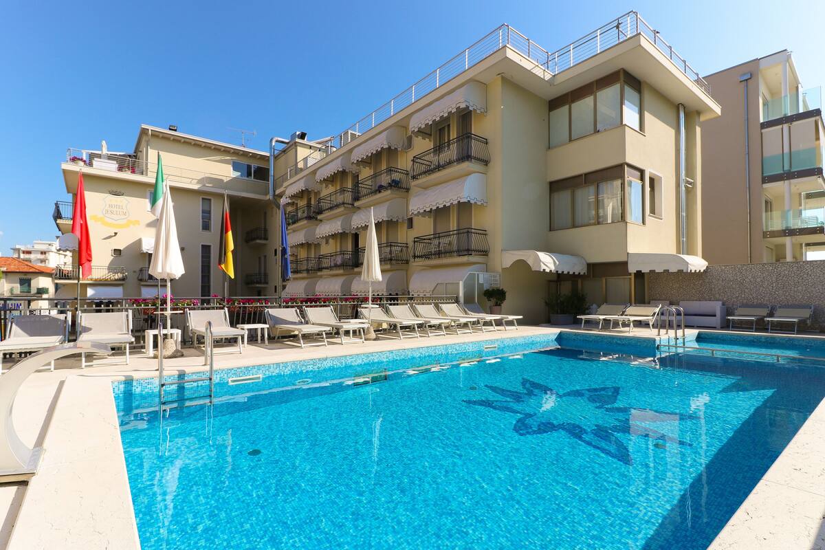 Seasonal outdoor pool, pool umbrellas, sun loungers