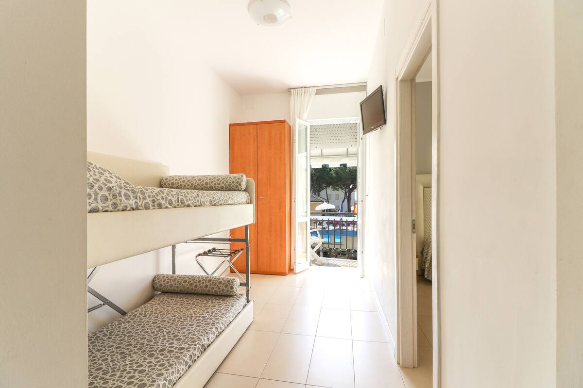 Family Room, 2 Bedrooms, Connecting Rooms | In-room safe, desk, WiFi (free), bed sheets