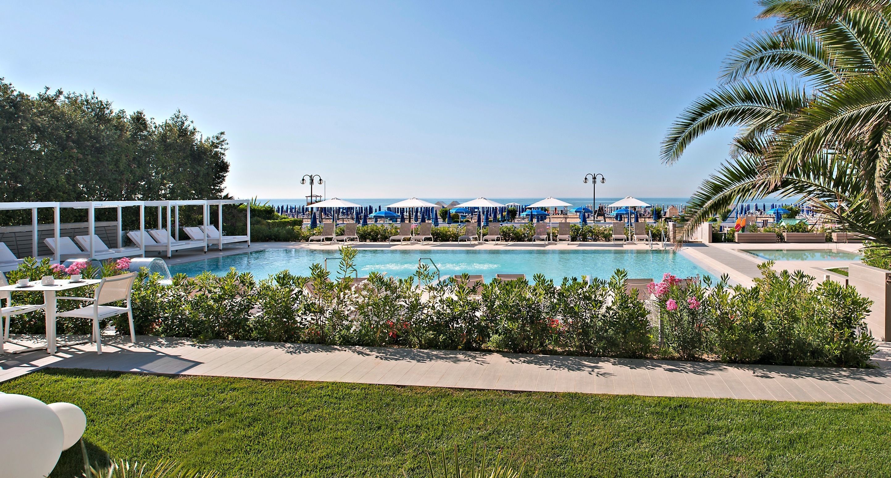 2 outdoor pools, pool umbrellas, pool loungers