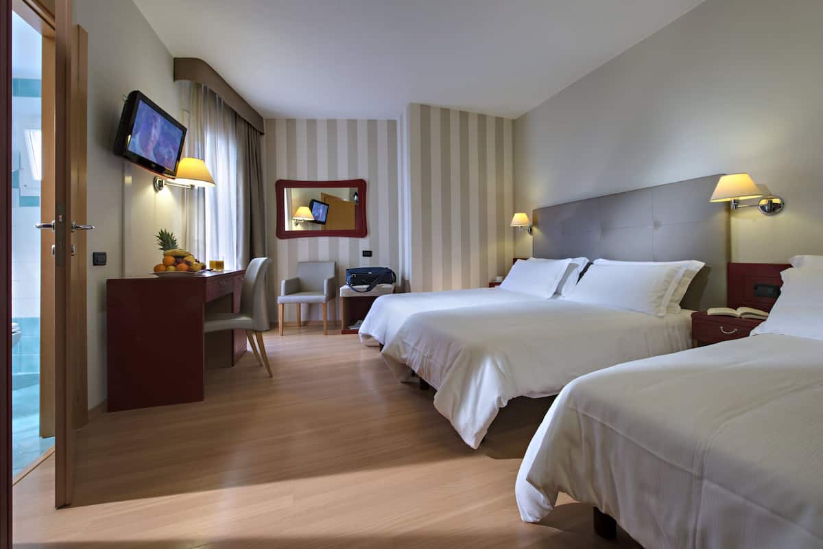 Premium bedding, down duvets, minibar, in-room safe