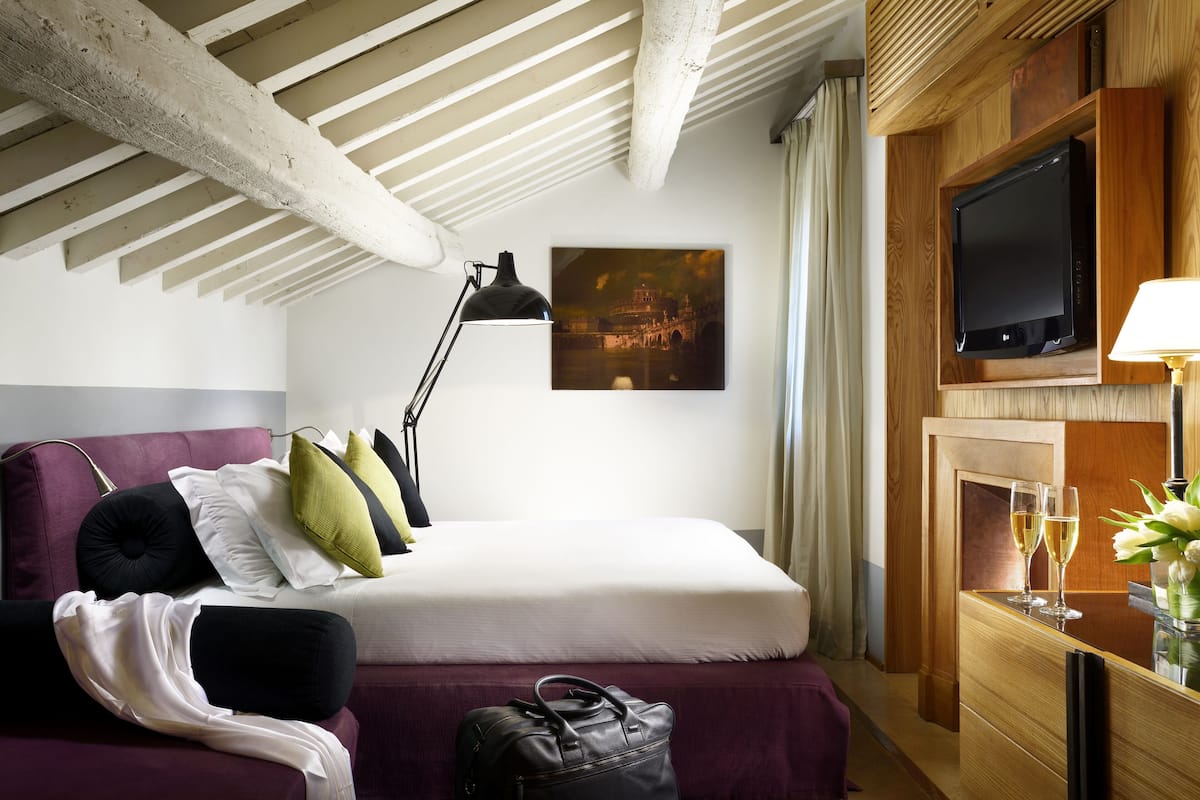 Suite | 1 slaapkamer, Italiaanse Frette-lakens, donzen dekbedden, een minibar
