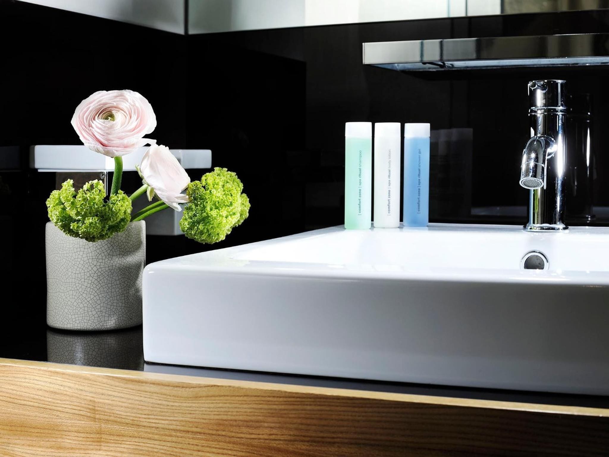 junior suite | bathroom | shower, hair dryer, bathrobes, slippers