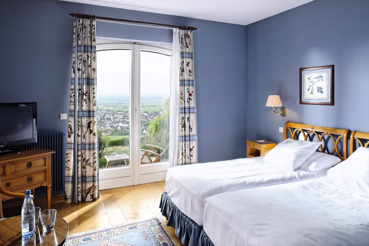 Biancheria da letto di alta qualità, materassi Tempur-Pedic, minibar