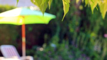 Seasonal outdoor pool, pool umbrellas, sun loungers