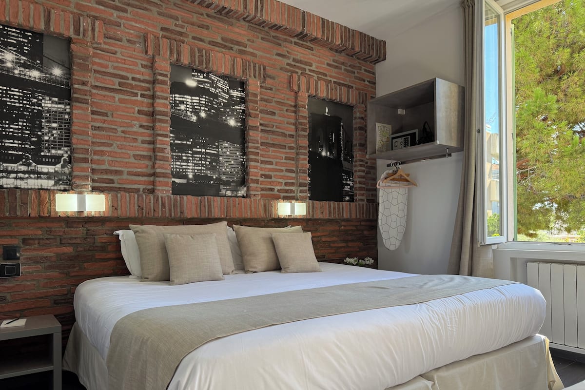 Habitación familiar | Ropa de cama de alta calidad y camas Select Comfort