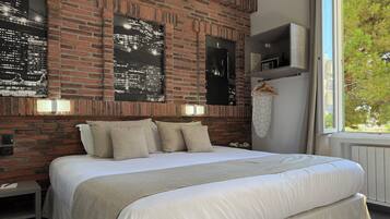 Chambre Triple Supérieur vue jardin | Premium bedding, Select Comfort beds, in-room safe