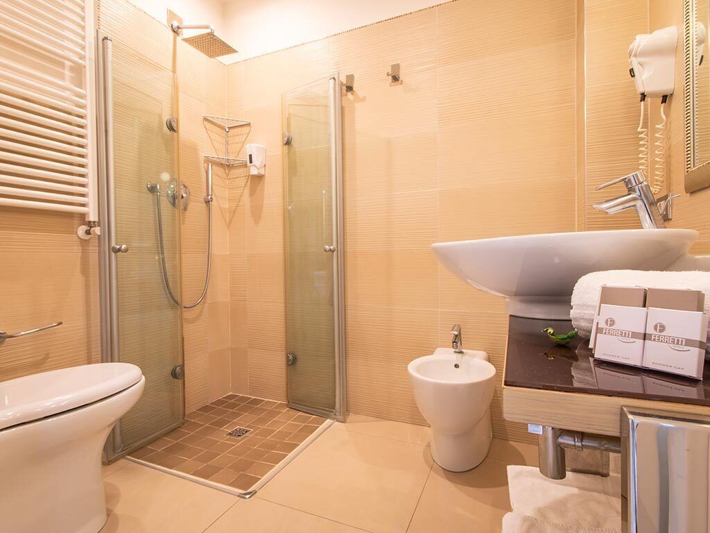 standard single room | bathroom | hair dryer, bidet, towels, soap