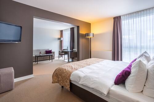 Biancheria da letto di alta qualità, materassi Select Comfort, minibar