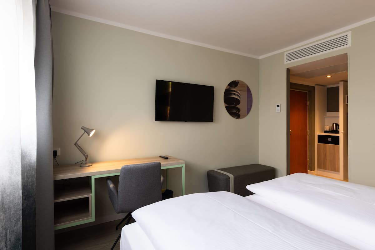 Ropa de cama de alta calidad, camas Select Comfort y minibar