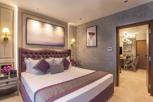 Premium bedding, down duvets, minibar, in-room safe