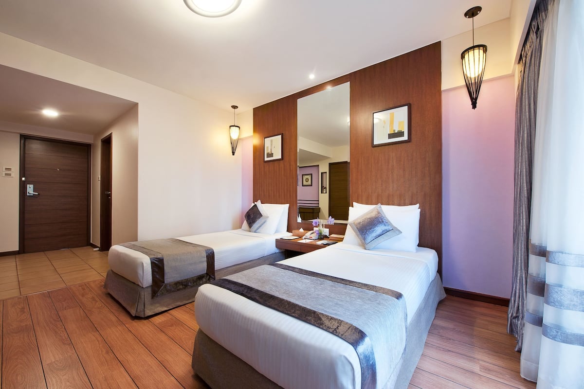 Camera Deluxe | Biancheria da letto di alta qualità, minibar, una cassaforte in camera
