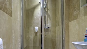 Shower, free toiletries, towels