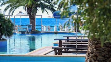 Outdoor pool, pool umbrellas, sun loungers