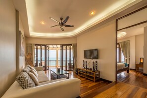 Sunset 2 Bedroom Penthouse | Living room | 40-inch TV with digital channels - Sunset Hill Boutique Resort (Ko Pha-ngan)