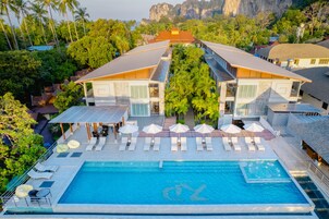 Indoor pool, outdoor pool, open 7:00 AM to 7:00 PM, sun loungers