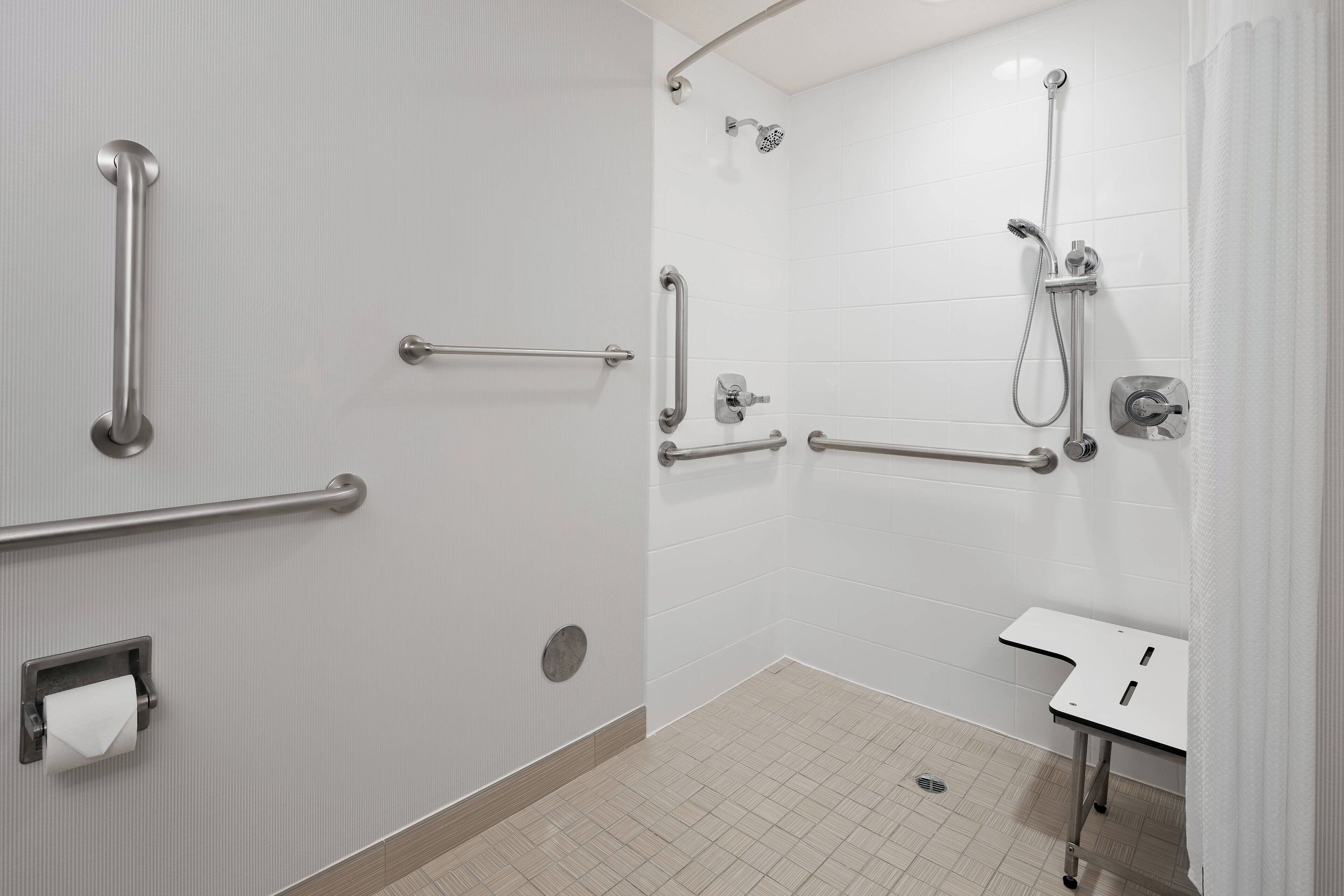 combined shower/bathtub, free toiletries, hair dryer, towels