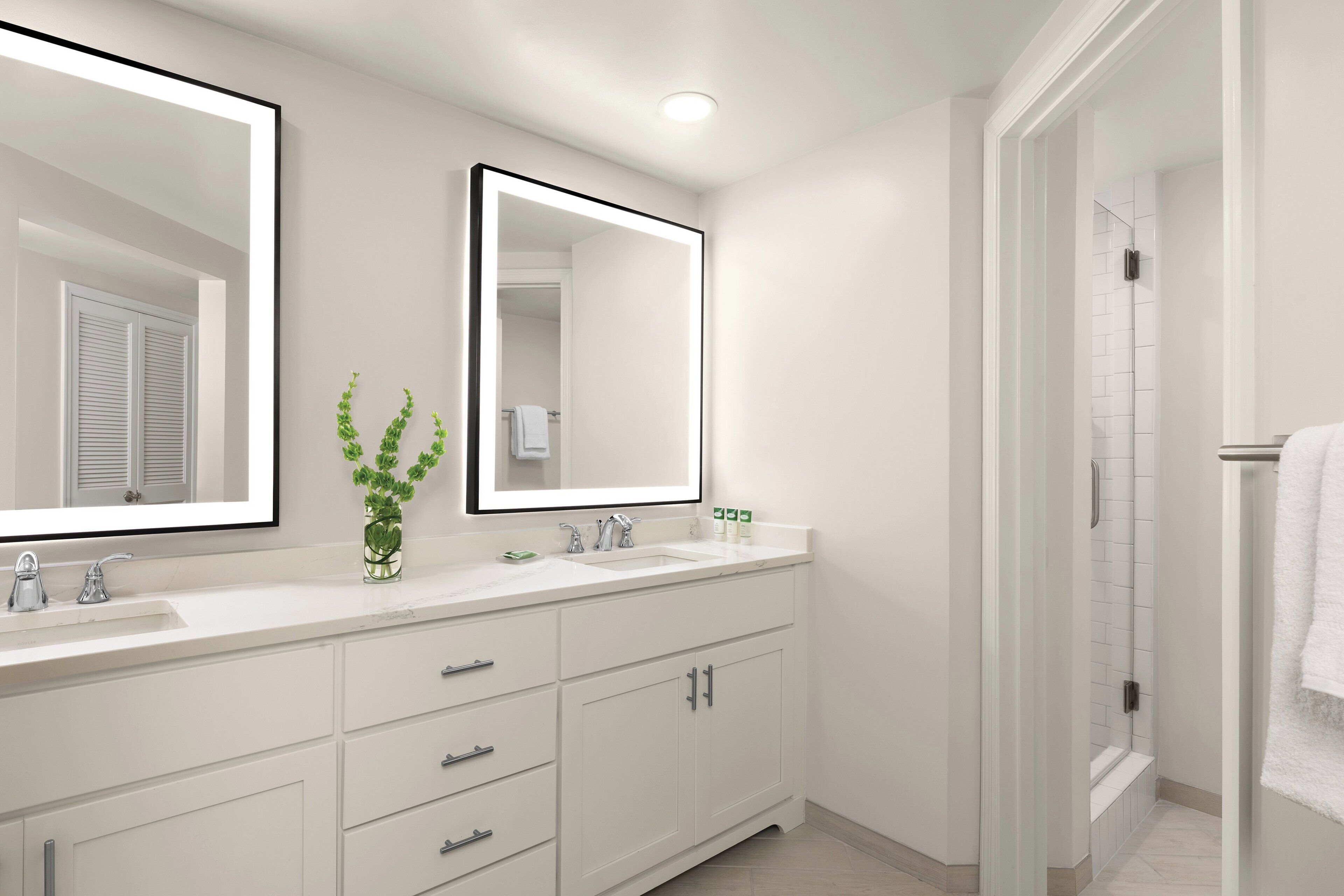 Separate bathtub and shower, hair dryer, towels