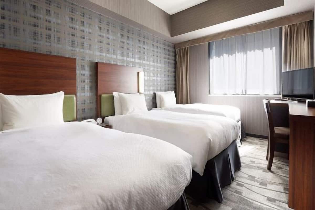 Premium bedding, down comforters, desk, blackout drapes