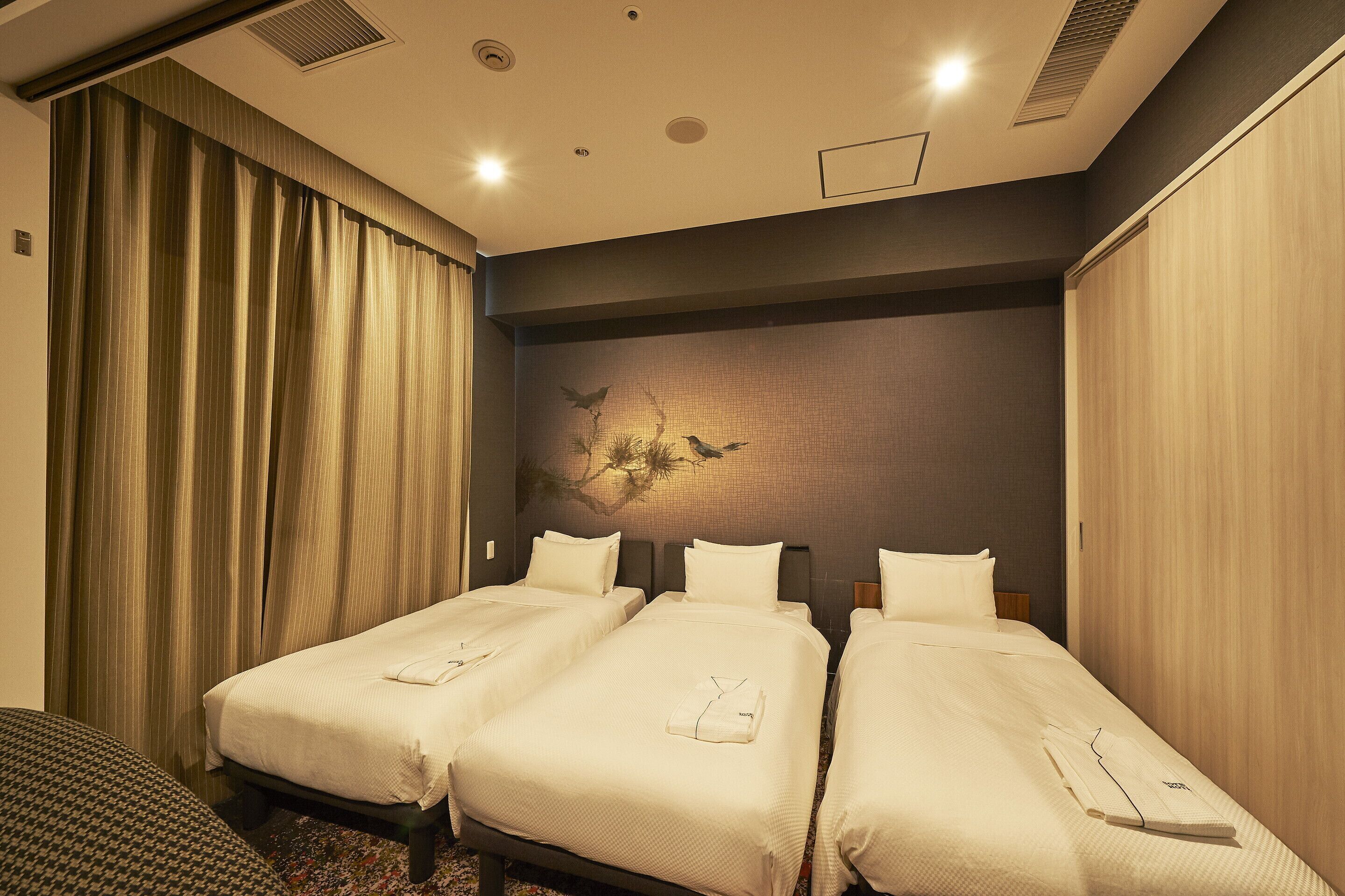 premium bedding, down duvets, desk, blackout curtains