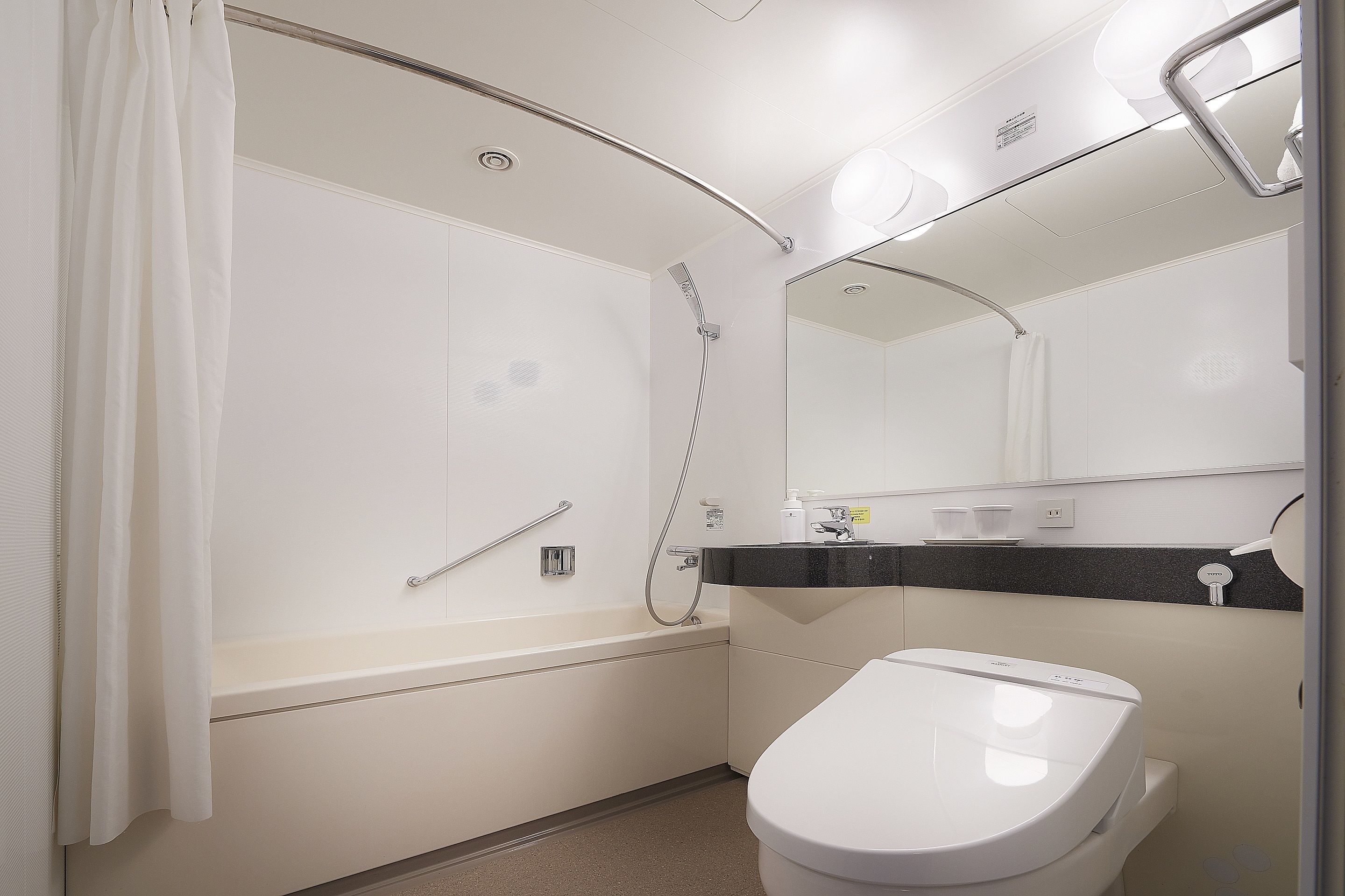 combined shower/bathtub, deep-soaking bathtub, free toiletries