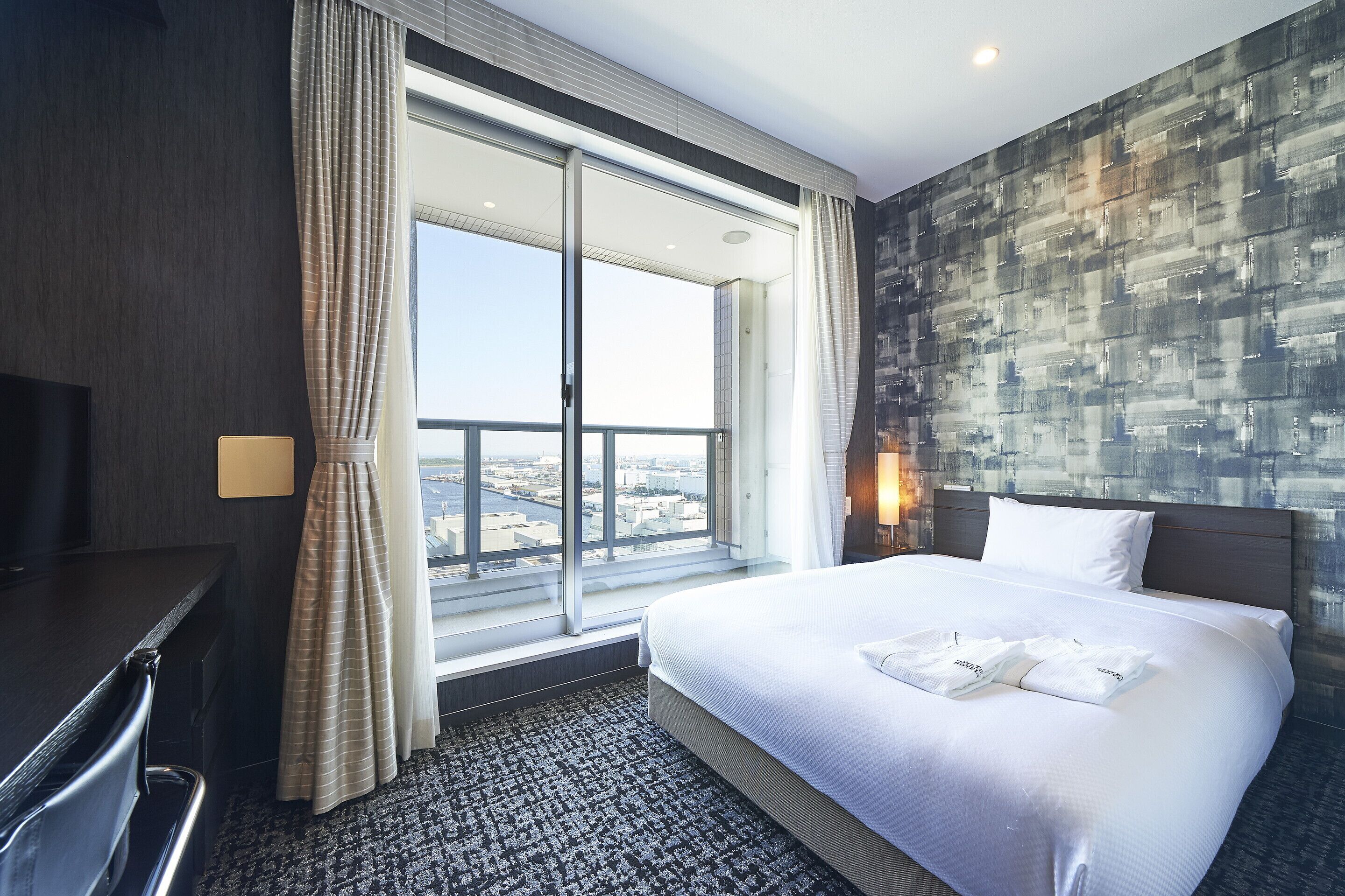 Premium bedding, down comforters, desk, blackout drapes