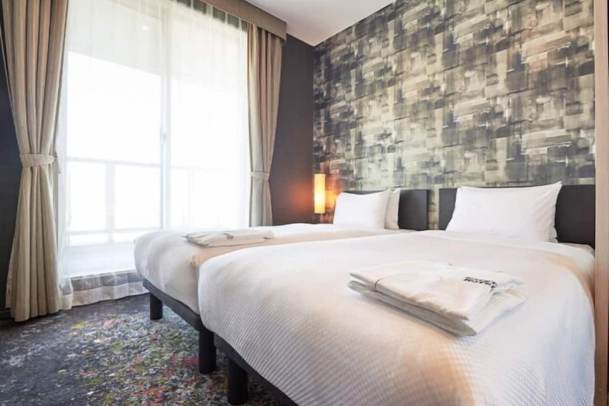 Premium bedding, down comforters, desk, blackout drapes
