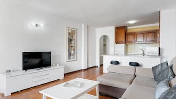 Standard Apartment, 1 Bedroom | Living area | Flat-screen TV
