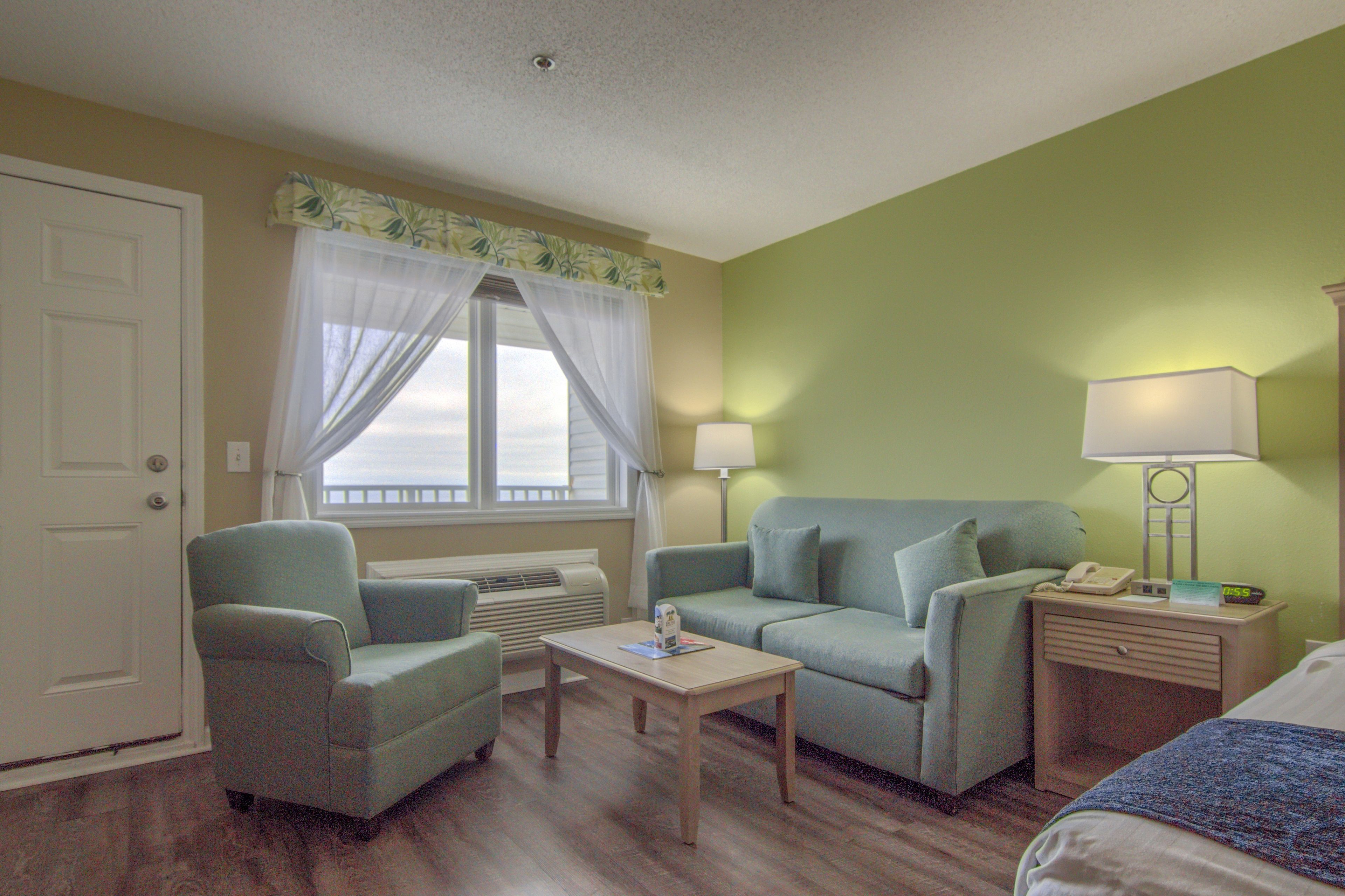 ocean view, standard 1 king bed | living area | tv