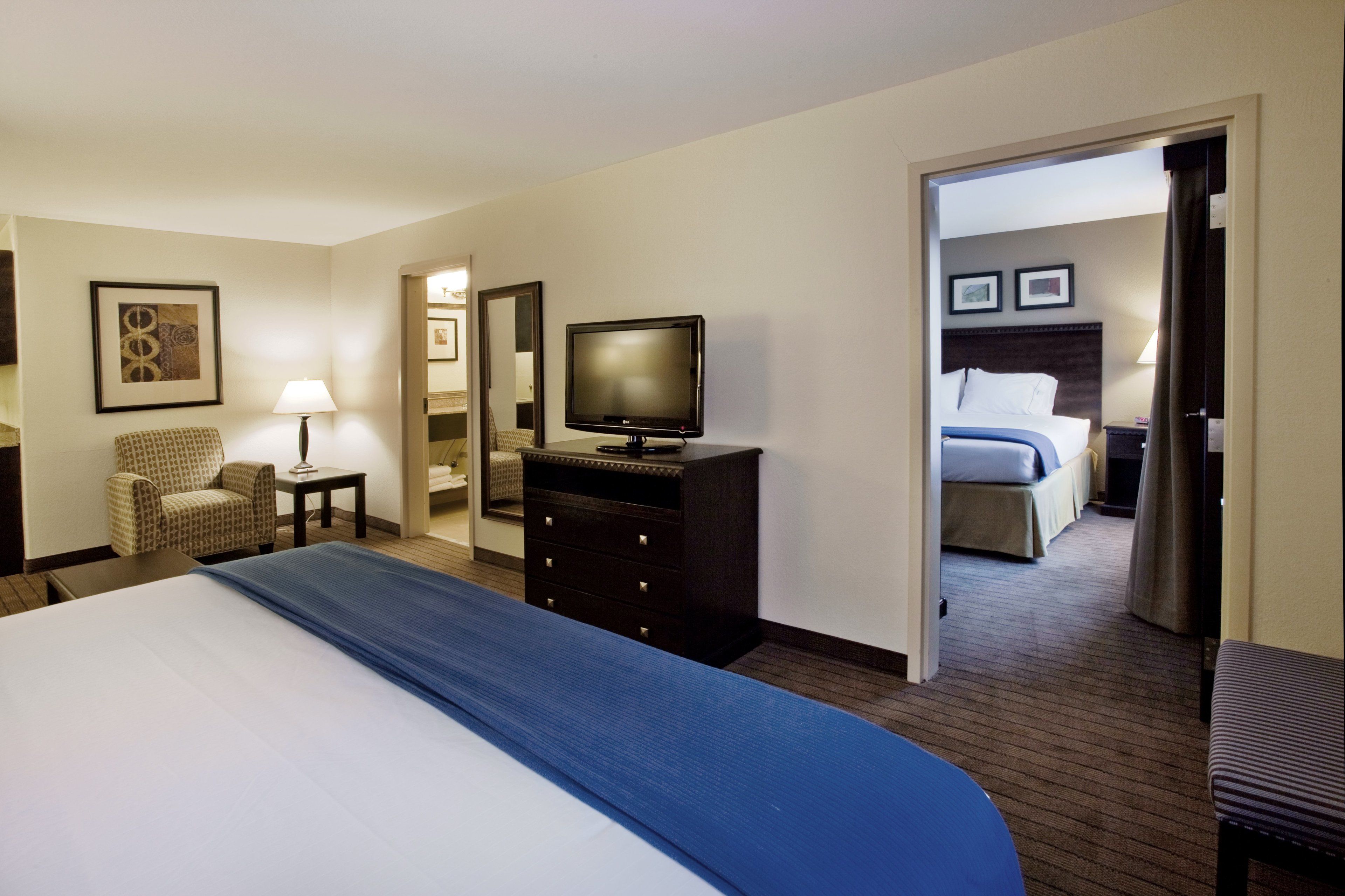 Desk, blackout drapes, iron/ironing board, rollaway beds