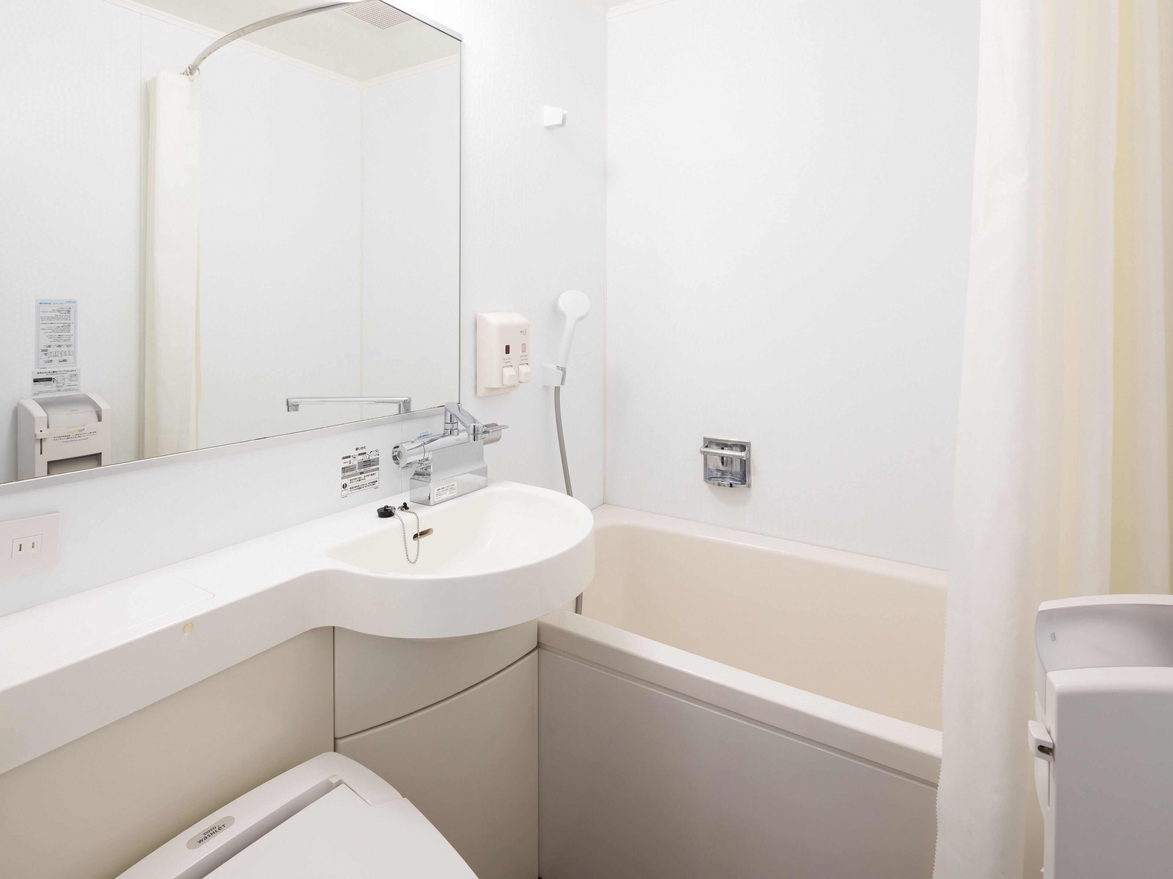 Combined shower/tub, hair dryer, bathrobes, slippers