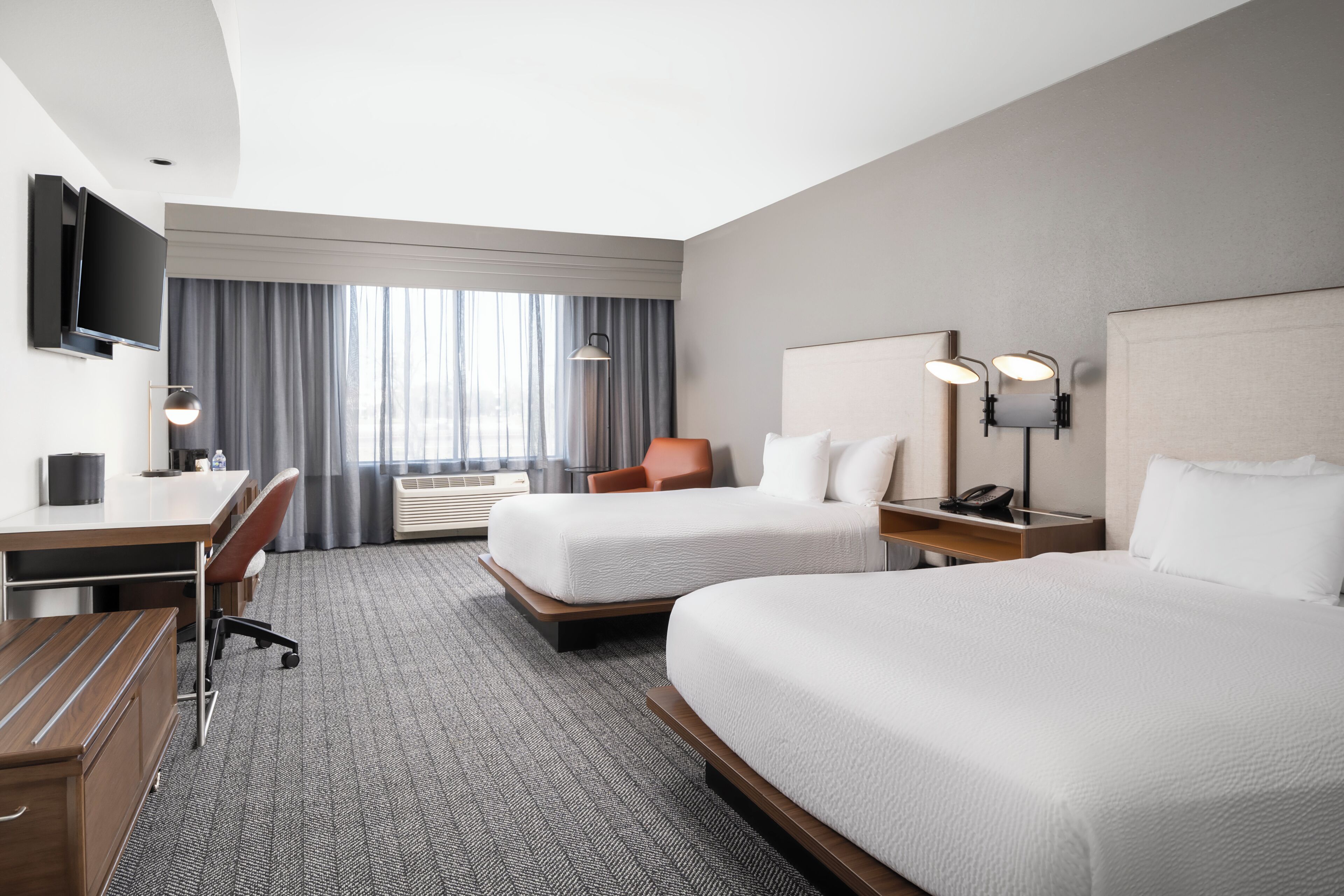 Premium bedding, desk, laptop workspace, iron/ironing board