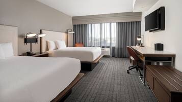 Premium bedding, desk, laptop workspace, iron/ironing board