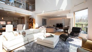 Premium Chalet, 5 Bedrooms | Living room | Flat-screen TV, DVD player