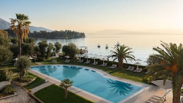 2 outdoor pools, open 10:00 AM to 8:00 PM, pool umbrellas, pool loungers