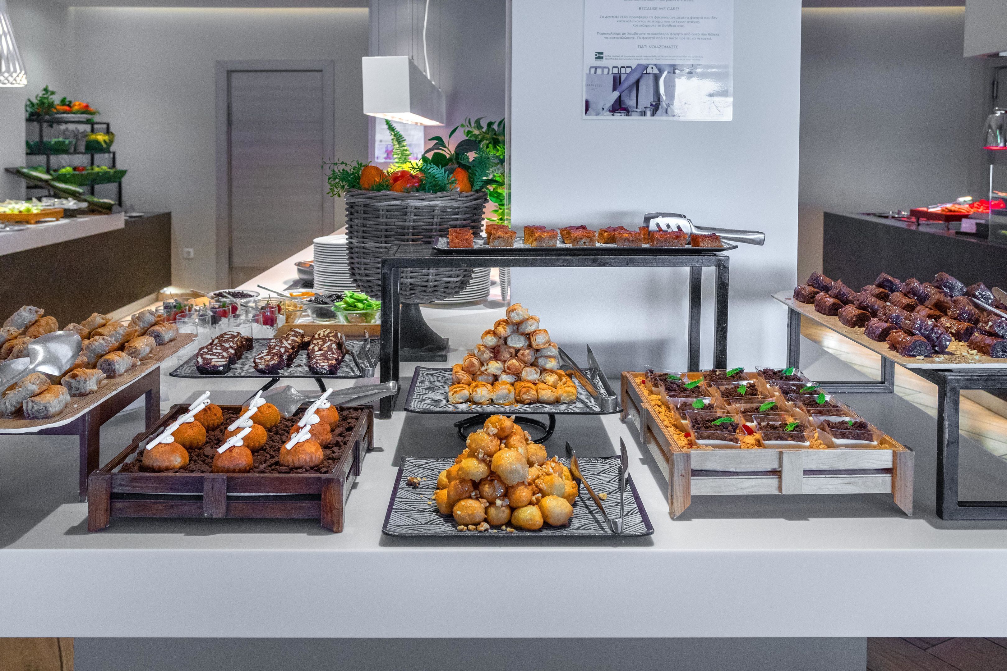 A buffet with various food items arranged on tables.