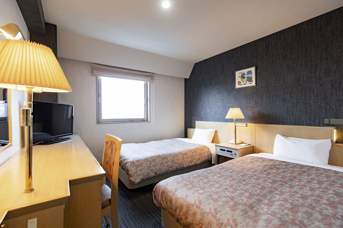 Twin Room, 2 Single Beds | Desk, blackout curtains, iron/ironing board, free WiFi