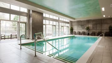 Indoor pool, open 6:00 AM to 10:00 PM, pool loungers
