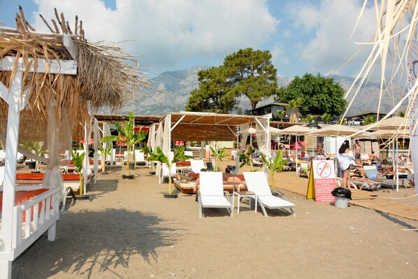 Private beach nearby, free beach shuttle, sun loungers, beach umbrellas