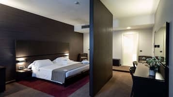 Premium bedding, down duvets, minibar, in-room safe