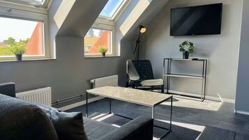 Family Apartment | Living area | 32-inch LCD TV with cable channels, TV