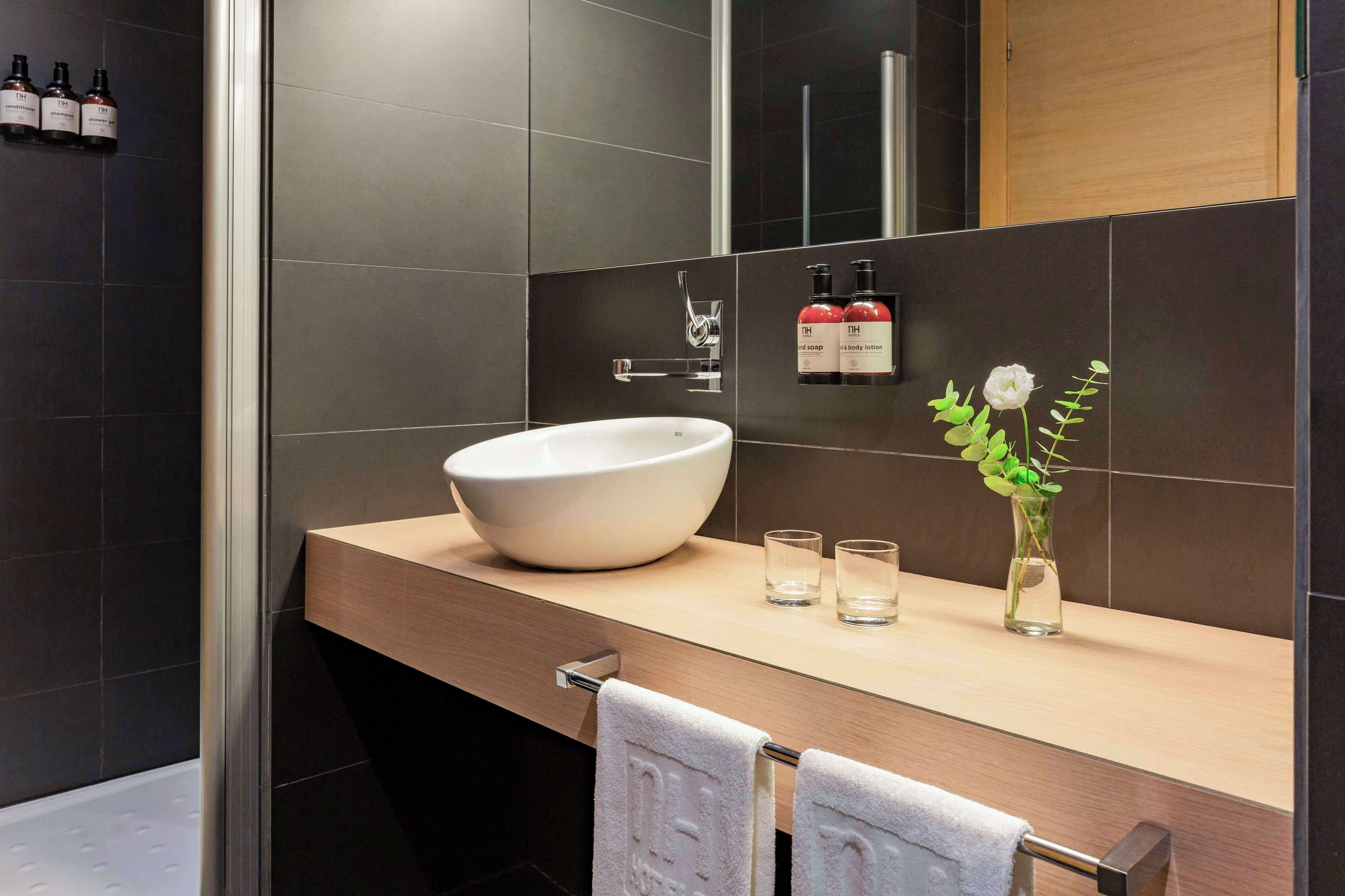 shower, eco-friendly toiletries, hair dryer, towels