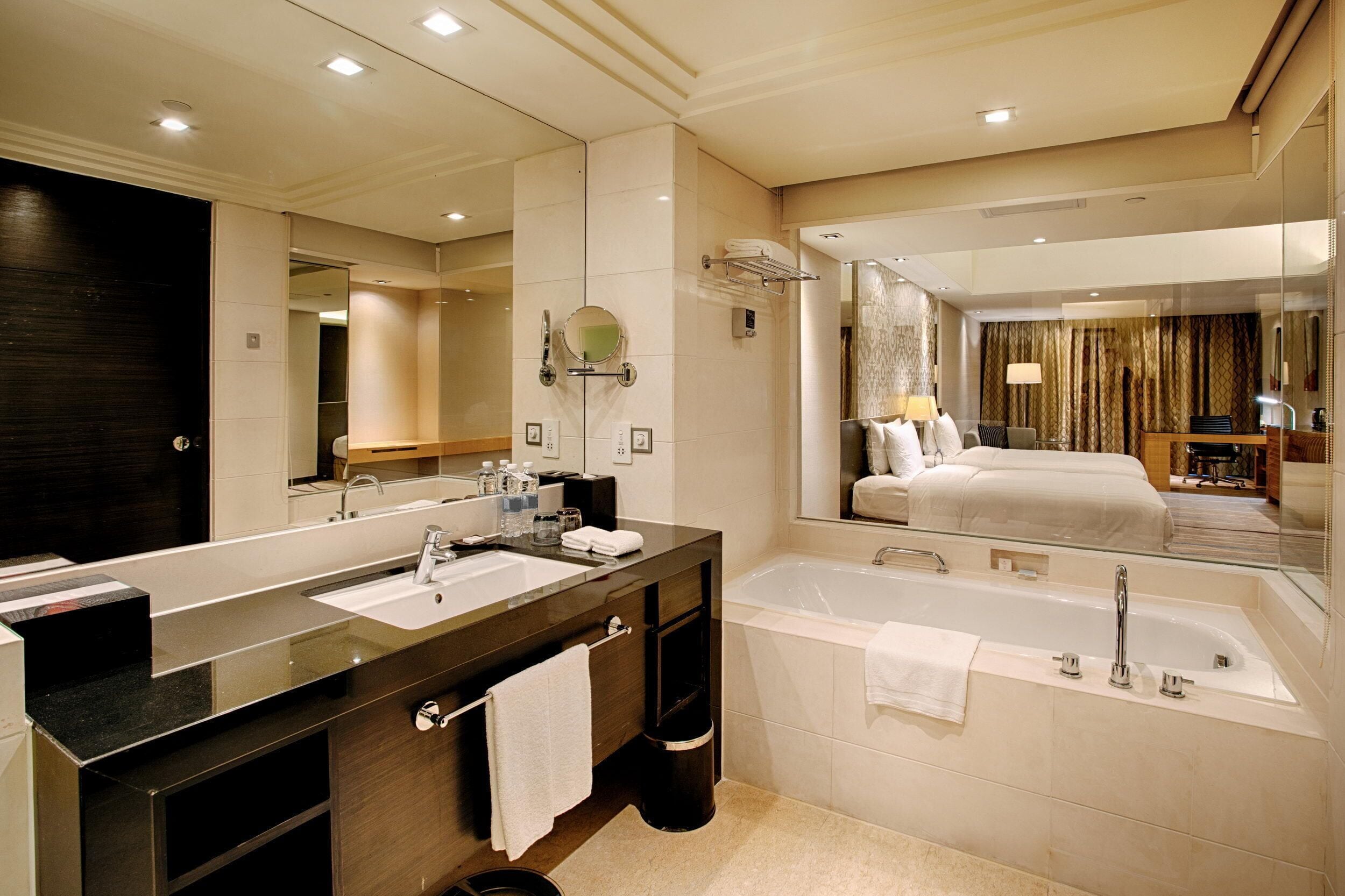 deluxe room, 2 double beds | down duvets, in-room safe, desk, laptop workspace