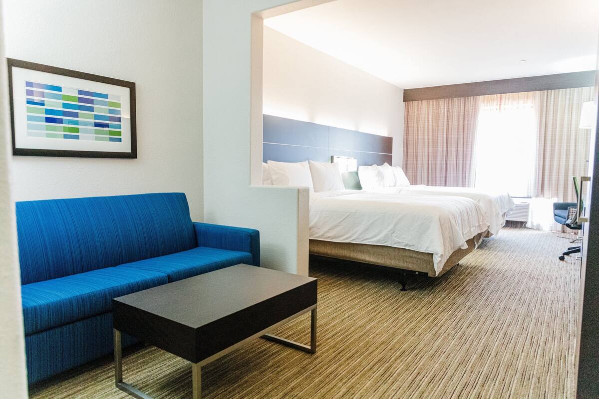 suite, 2 queen beds, accessible bathtub (communications) | in-room safe, desk, iron/ironing board, cots/infant beds