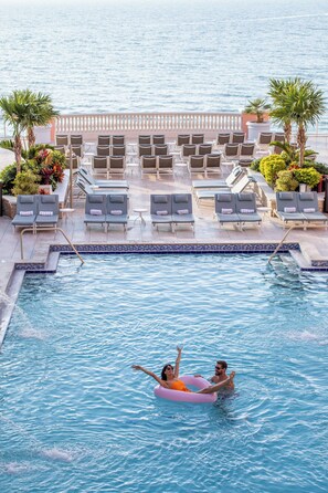 Outdoor pool, open 8:00 AM to 10:00 PM, cabanas (surcharge)