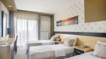 Family Triple Room, 1 Bedroom, Bathtub, Garden View | Minibar, in-room safe, desk, free WiFi