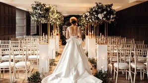 A wedding ceremony aisle with white chairs and floral arrangements. - Kimpton Blythswood Hotel & Spa by IHG (Glasgow)