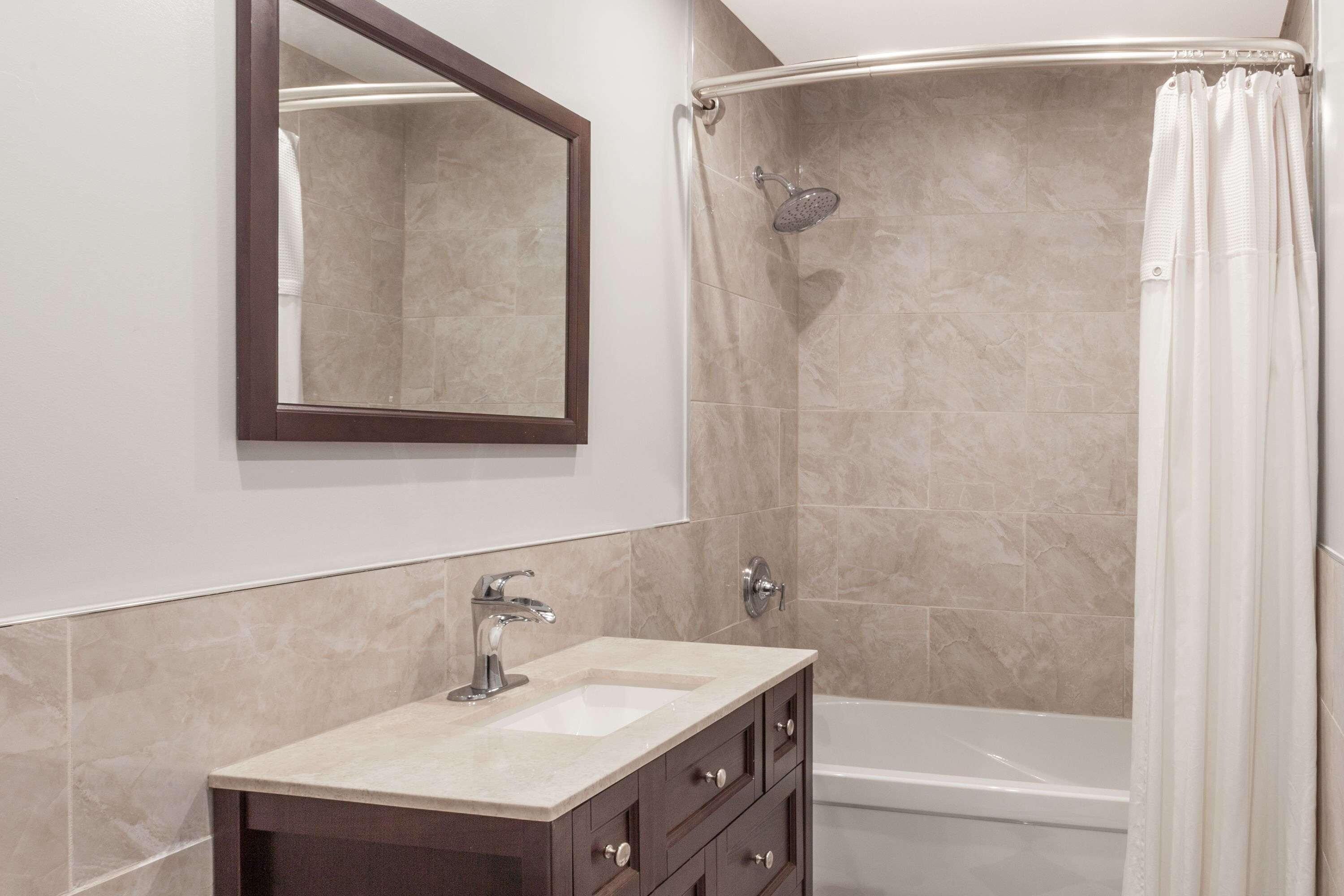 Separate tub and shower, deep soaking tub, free toiletries, hair dryer