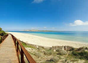 Beach nearby, white sand, beach umbrellas